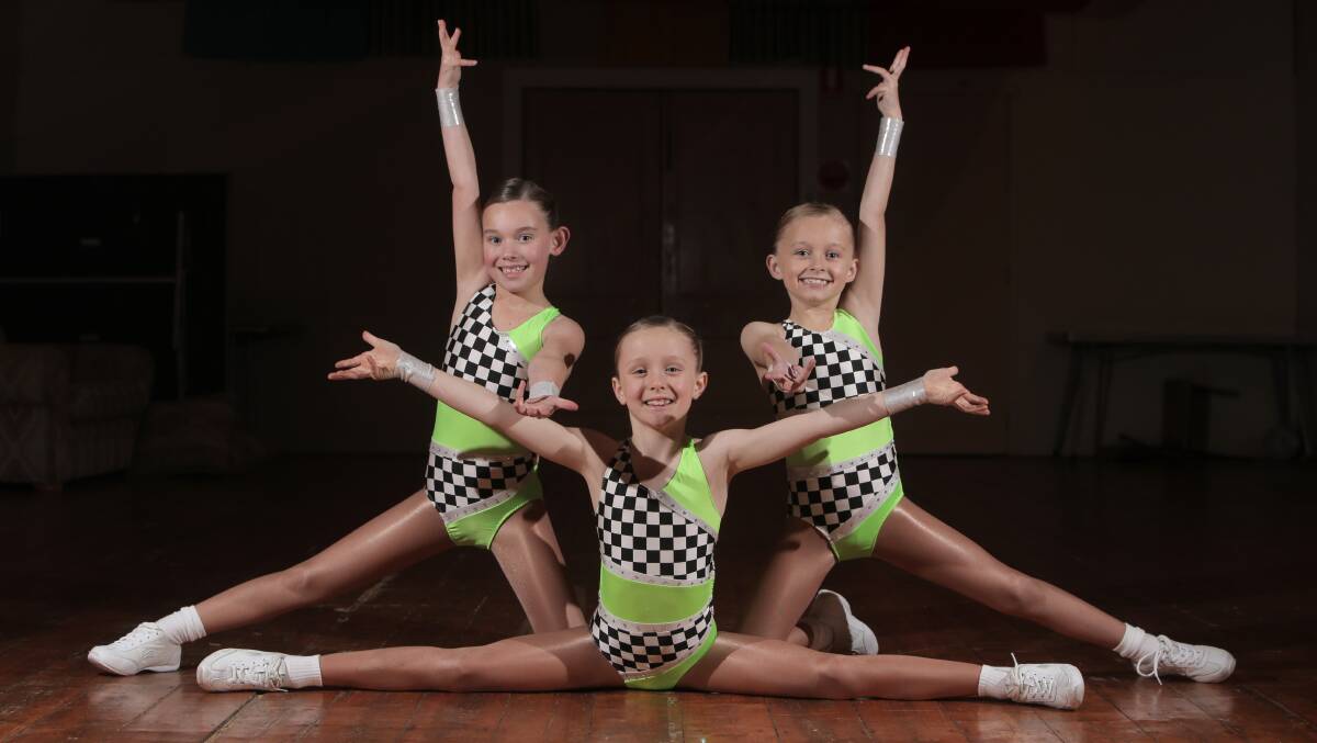 Dayna Haberfield (left), Georgia Dalton and Stella Hose are poised to perform at the School Aerobics state championships in Geelong this weekend. 140616VH16 Picture: VICKY HUGHSON
