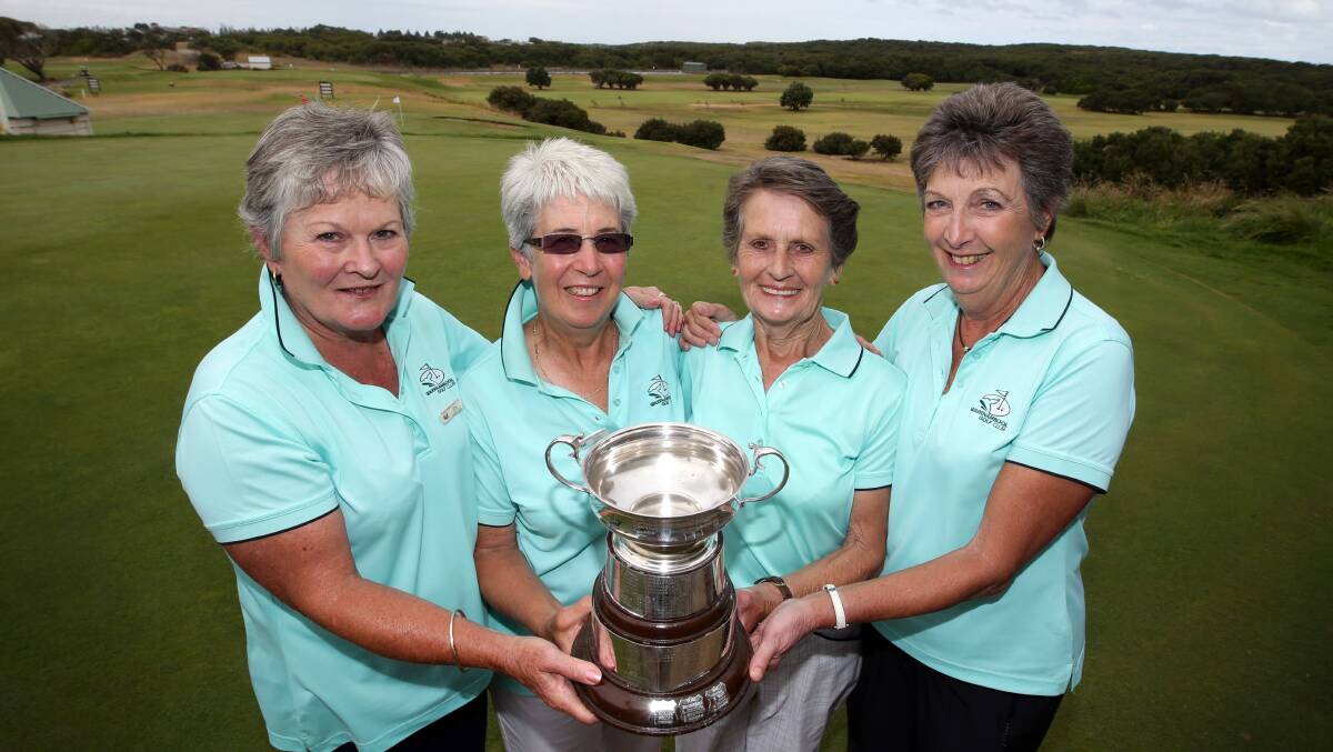 Celebrating their victory in the Marjorie Robinson Bowl event were (from left) Di Howland, Sue Williams, Joan Jacobsen and Trish Sullivan.