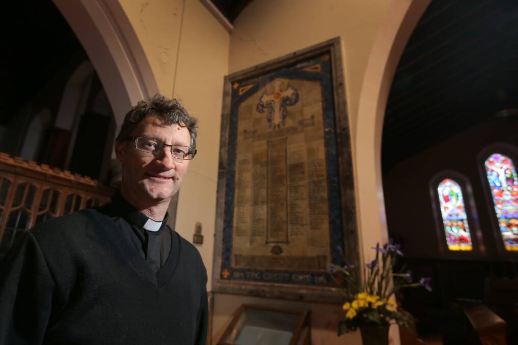 Father Scott Lowery says Warrnambool Christ Church’s World War 1 memorial tablet needs restoration. 150519RG10 Picture: ROB GUNSTONE