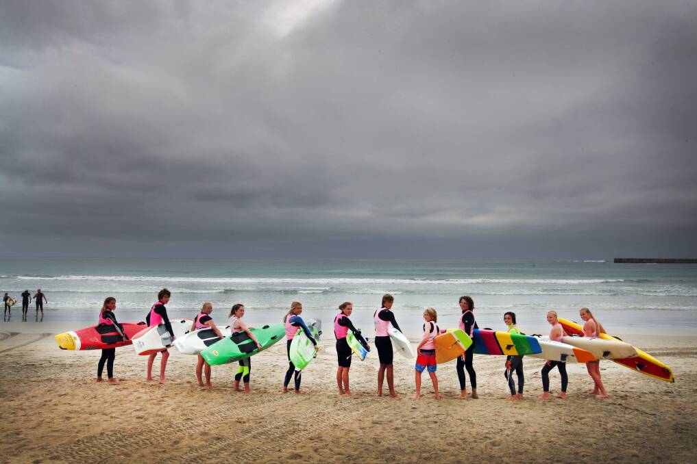 Warrnambool Surf Life Saving Club members Paddy O’Brien (left), Hugh Ryan, Scarlett Hill, Jemima McCoy, Claudia Owen, Freya Parotte, Connor Cook, Lachlan Timms, Matt Hardiman, Brayden Casamento, Anya Cook and Eve Aulesbrook are primed for the second round of the Life Saving Victoria surf summer series at Anglesea tomorrow. They capped off their preparation with a training session at Lady Bay on Thursday. 150101LP03 Picture: LEANNE PICKETT
