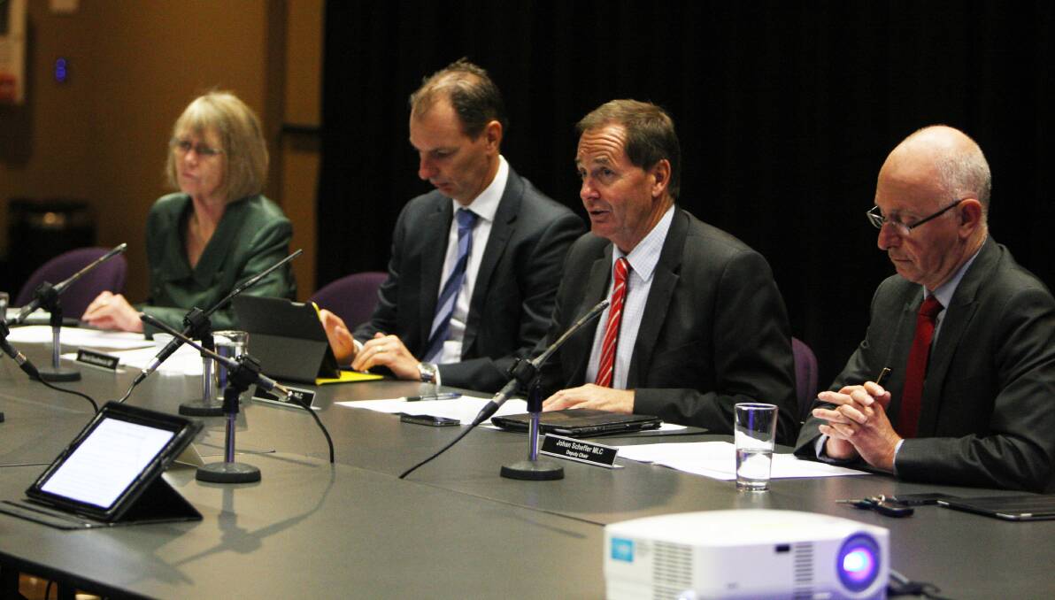 Inquiry members Sandy Cook (left), David Southwick, Simon Ramsay (chairman) and Johan Scheffer hear submissions. 