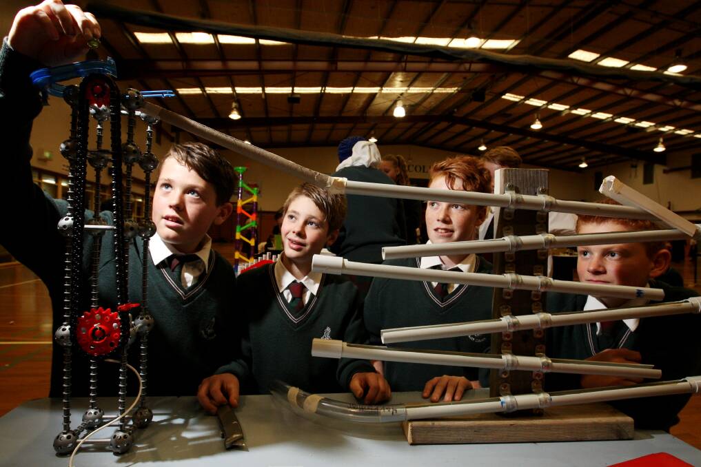 Brauer College year 7 students (from left) Harry Moss, Jordan Laird, Trent Torney and Jack Tanner, all 12, with their Rube Goldberg Machine. 
150515LP11 Picture: LEANNE PICKETT