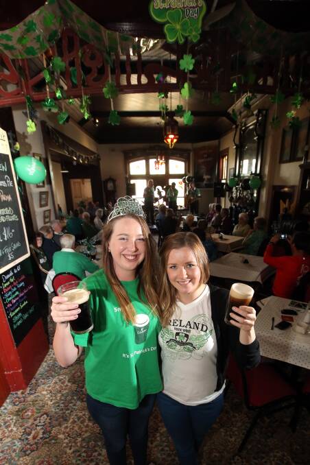 Irish visitors living and working in the Koroit area, Leeanne Donohoe and Emma Shannon, enjoy St Patrick’s Day at Mickey Bourke’s Koroit Hotel. 
150317DW67 Picture: DAMIAN WHITE