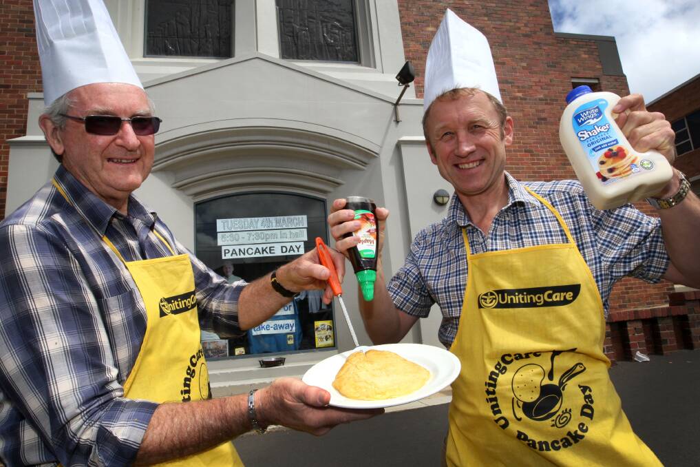 Uniting Church Pancake Day co-ordinator Barrie Baker (left) and Warrnambool minister Reverend Malcolm Frazer are all set for the tasty fund-raiser. 