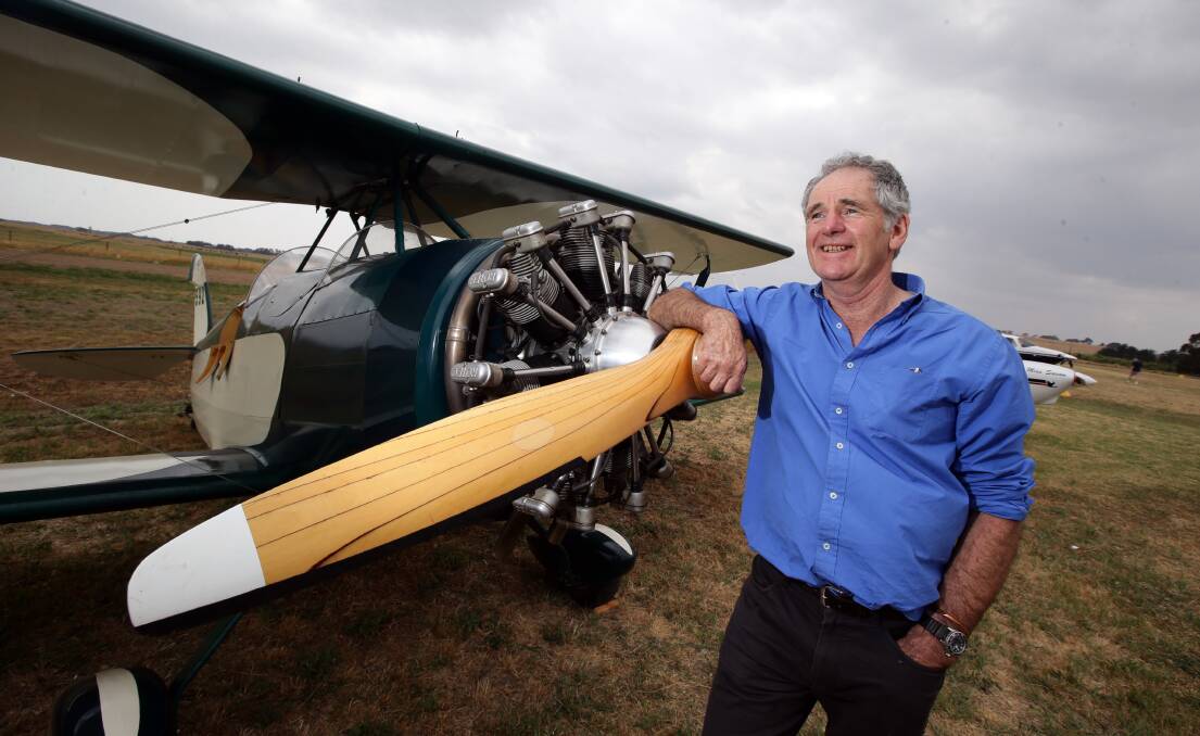 Digby pilot Derek Dyer with his home-built Fisher Celebrity biplane at the Coden Aero Club Fly-In on Saturday. 