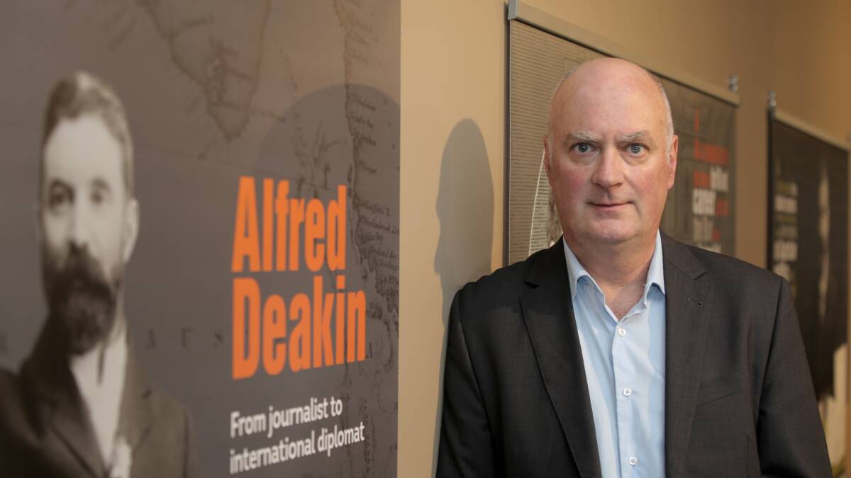 Head of campus at Deakin Warrnambool, Professor Gerry Quinn, at the exhibition in the Lighthouse Theatre. 