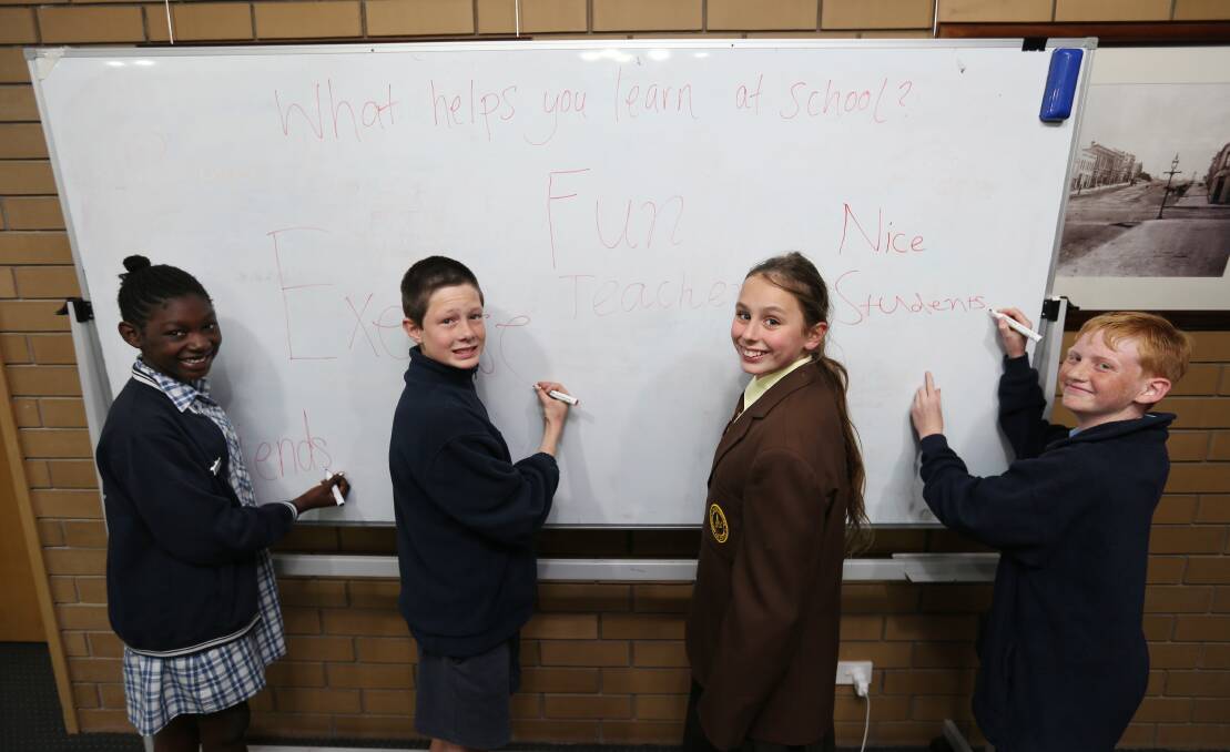 Primary school pupils (from left) Malka Yota, 12, from Warrnambool West Primary School, Morgan Morland-Hunt, 11, from Merrivale Primary School, Syrenite Hewson, 12, from Warrnambool Primary School and Angus McLauchlan, 12, from Warrnambool East Primary School, take part in a year 12 retention research session at the city council offices. 140914VH26 Picture: VICKY HUGHSON