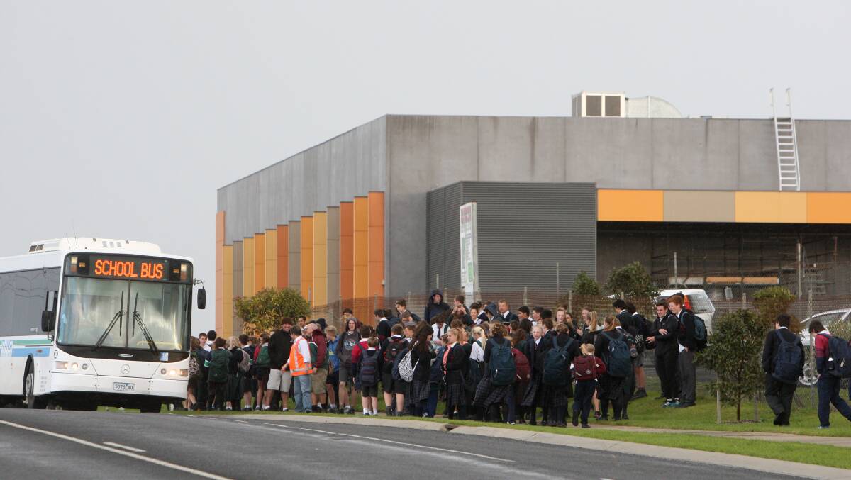 Brauer College students are evacuated from the northern end of the school grounds, about a hundred metres from where the homemade pipe bomb was found yesterday afternoon. Picture: AARON SAWALL