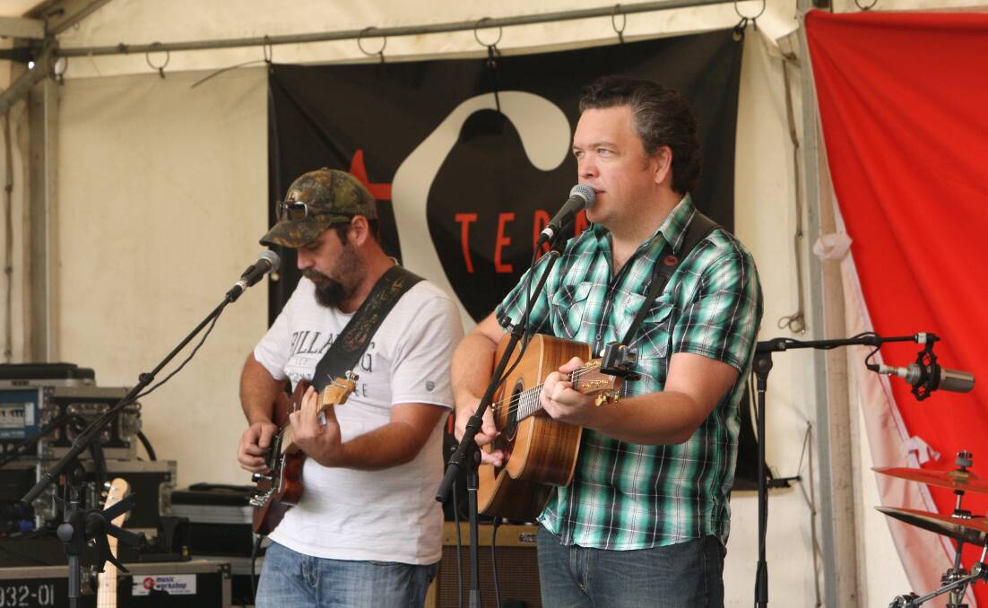 Anthony Taylor (left) and Daniel Thompson kept the punters entertained at the Terang Country Music Festival on Saturday. 