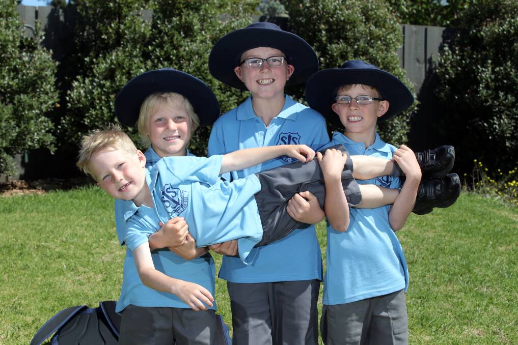 When St Joseph’s Primary School opens its gates on Monday, new prep pupil Trae Brereton, 6, will get a helping hand from three of his brothers — Nate, 8, Kayne, 12, and Kye, 9. 150128DW09 Picture: DAMIAN WHITE
