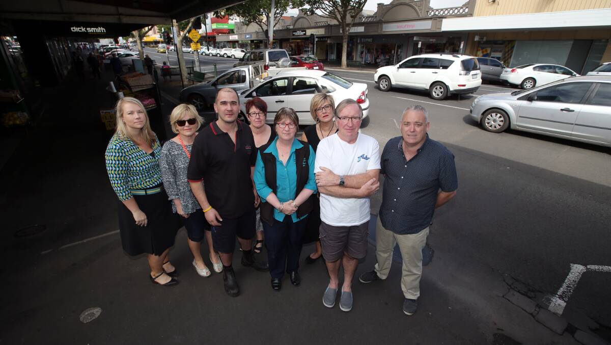 Parking the key: Liebig Street business operators (from left) Ellie Read, Alison Noseda, Mario Materia, Lyn Savage, Jan Emonson, Debbie Arnott, Max Taylor and Peter Clancey. 150121DW16 Picture: DAMIAN WHITE