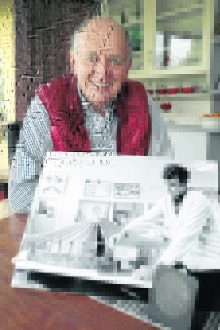 Retired builder Herb Morrow with a picture of himself as an apprentice in 1969 with the model of the Tower Hill natural history and visitor centre, which he is now hoping to locate. 
140724RG14 Picture: ROB GUNSTONE