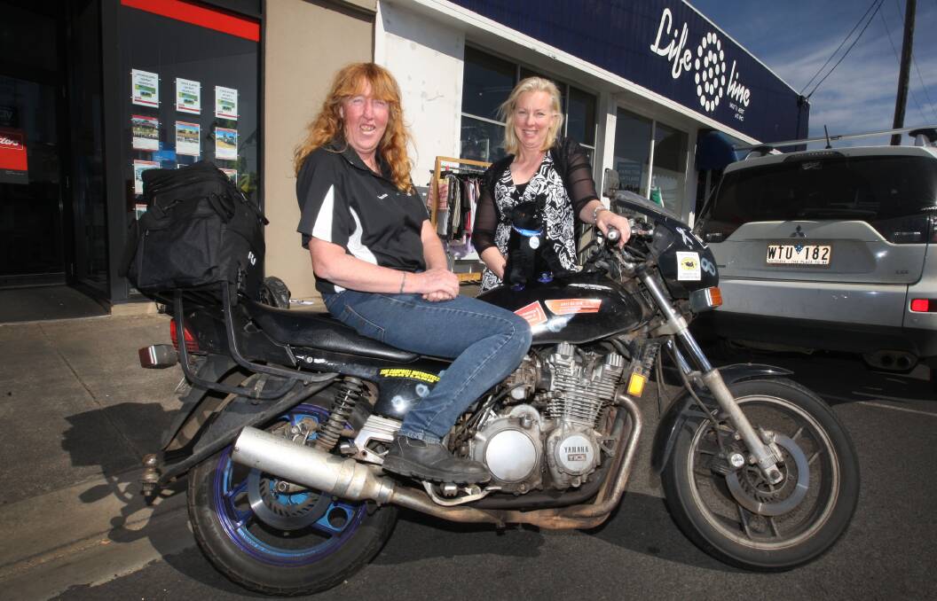 Black Dog Ride facilitator Heather Muskee (left), with Lifeline South West Victoria CEO Meredith Ericson, prepares for Sunday’s ride, which raises money for the local centre.