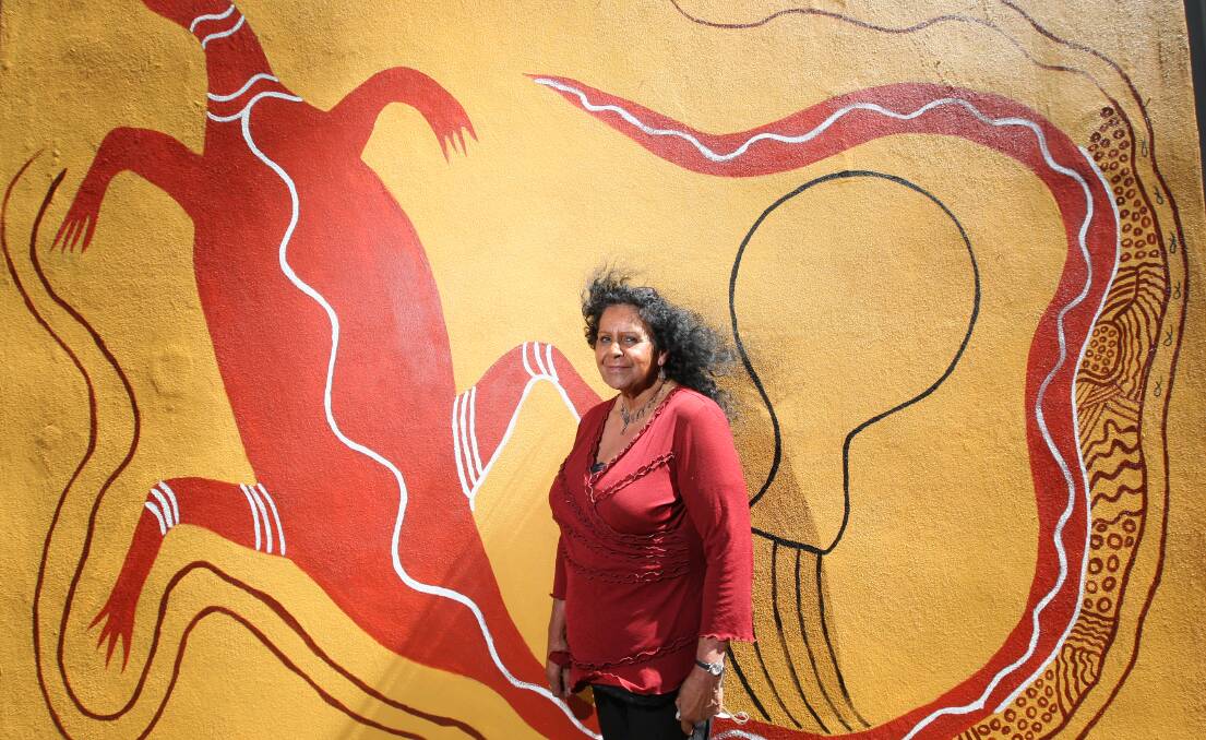 Koori Court officer Patricia Clarke has painted a mural with her sister Fiona Clarke for the 10-year anniversary of the indigenous legal initiative. 