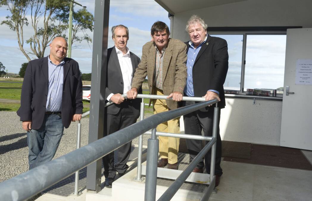 At yesterday’s opening of extensions to the Purnim hall are (left to right) Moyne Shire community engagement officer Craig Midgley, mayor James Purcell, hall committee president David Macdonald and Moyne councillor Jim Doukas.
