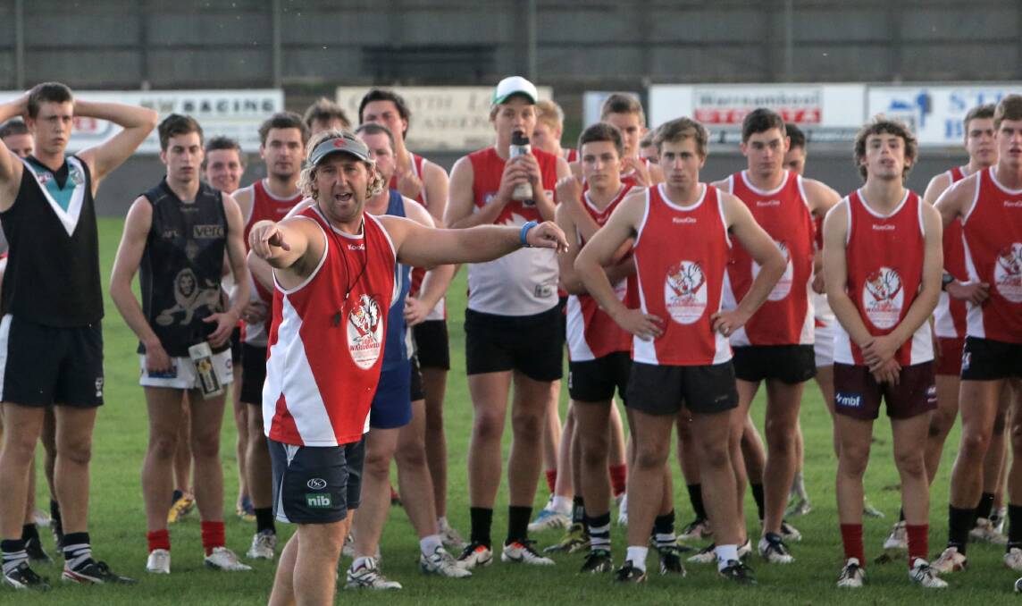 Jeremy Mitchem leads his troops at a Roosters training session earlier this week. 