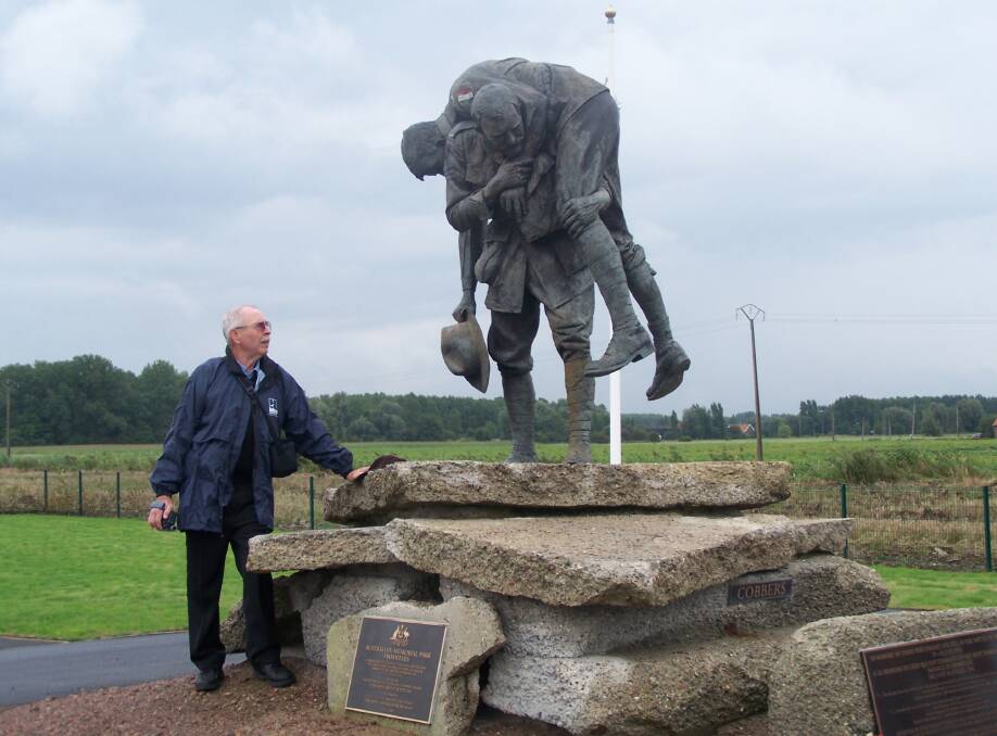Max Cameron at the Cobbers statue in Fromelles in France. The
statue was inspired by the actions of his great uncle Simon Fraser who was among those who rescued wounded men from the battlefield at Fromelles.
