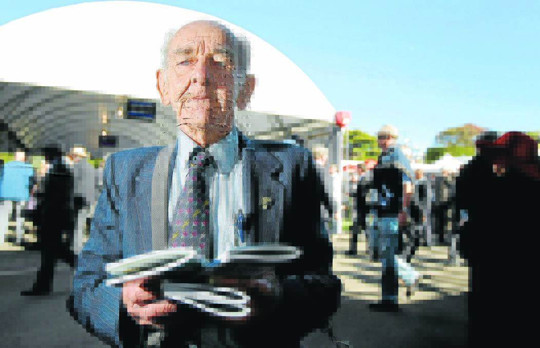 Veteran race book seller Gordon Ballis pictured at last year’s May carnival. 