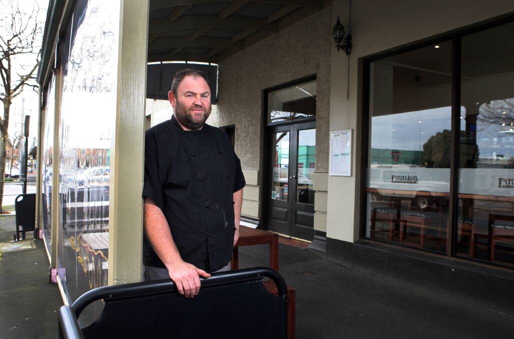 Michael McGowan, owner of Warrnambool’s Reunion Café Bar Restaurant, believes a ban on smoking at outdoor dining areas would have little effect on his business. 
140809LP10 Picture: LEANNE PICKETT
