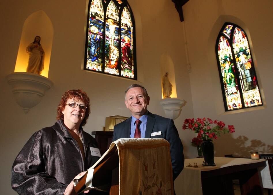 Southern Community Sisters of Mercy’s Sr Berenice Kerr, from Ballarat, and Emmanuel College principal Peter Morgan in the newly-refurbished St Ann’s chapel at the college. 141030LP10  Picture: LEANNE PICKETT