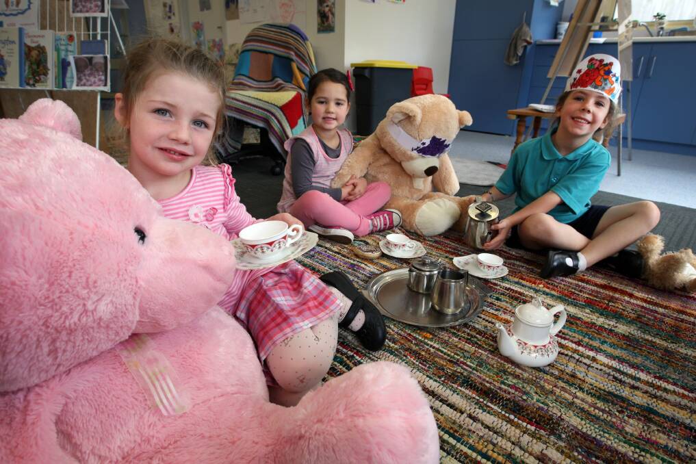 Mahogany Kindergarten children Victoria Lanyon, 4, (left) and Ava Lee, 4, share morning tea with Warrnambool West prep pupil Molly Hill, 5, and some furry friends. 140403LP04 Picture: LEANNE PICKETT