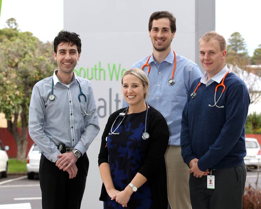 Deakin Medical School’s 2013 dux Dr Ben Fleming (left), who is completing his internship at Warrnambool Base Hospital, with third-year students Maddy Corke, from Brisbane, Graham Spencer, from Vancouver, and Robbie Mann, from Melbourne. 