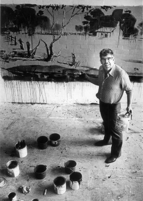 Rolf Harris at work painting the mural in 1986.