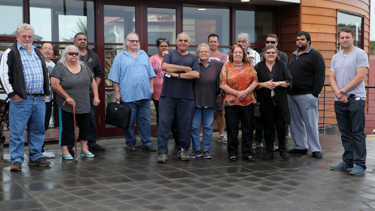 Geoff Clark (at left) and supporters leave the Framlingham Aboriginal Trust annual general meeting yesterday after it had to be abandoned due to a boycott by some shareholders, meaning a quorum could not be achieved. 140924RG04 Picture: ROB GUNSTONE