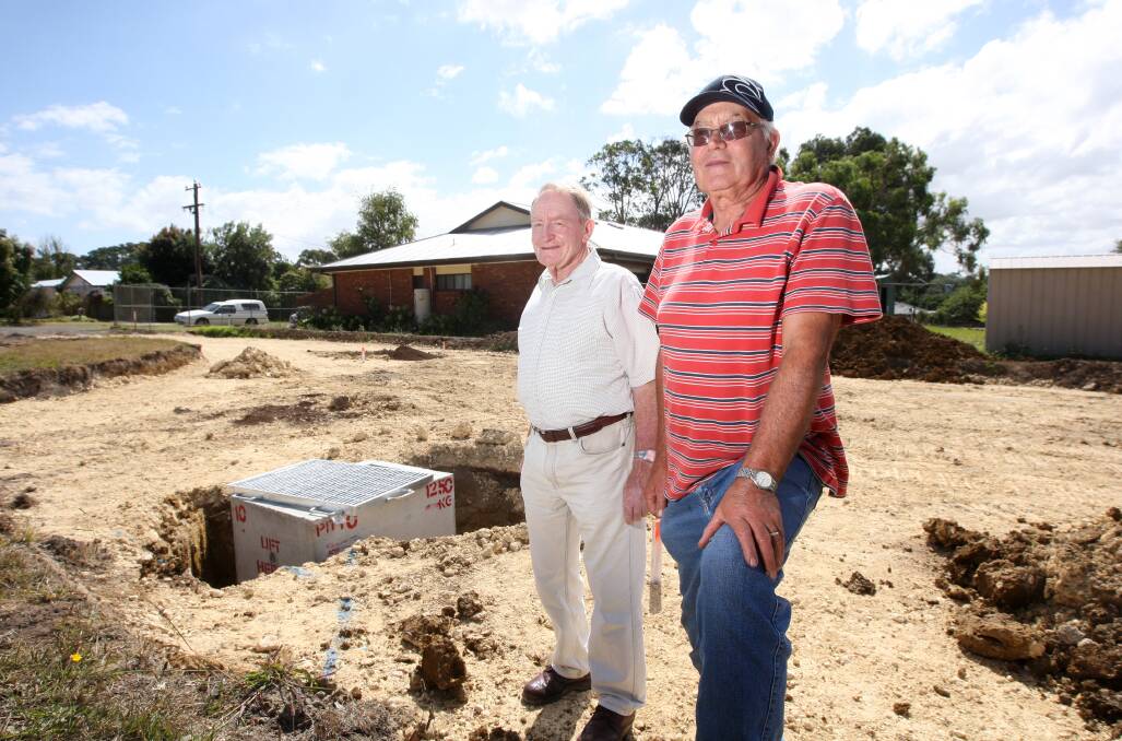 Timboon Abbeyfield committee members Peter Murphy (left) and Gerard Vogels inspect progress on the first new units at the retirement accommodation and aged care project. 