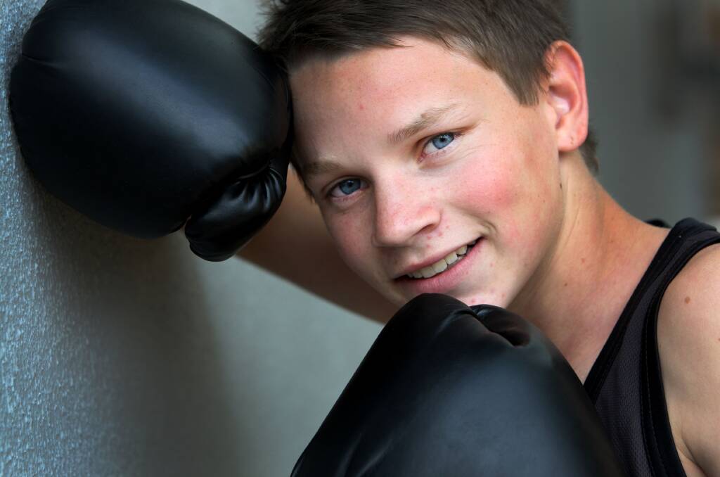 Warrnambool boxer Jye Clark, 15, back home after his split-points decision win in the 48kg division of the Silver Glove Championship in Melbourne on Sunday. 
