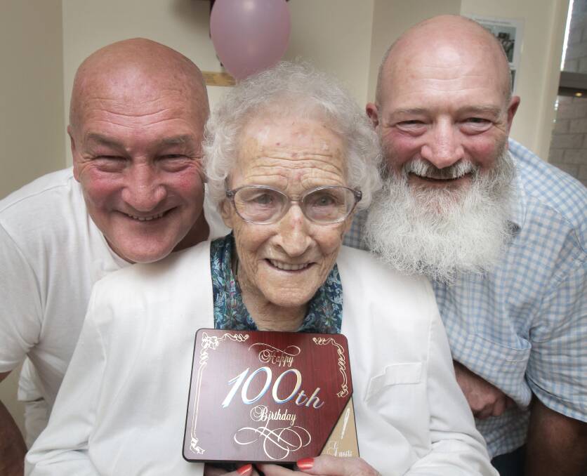Florence MacLean celebrates her 100th birthday with sons Jack (left) and Bob.