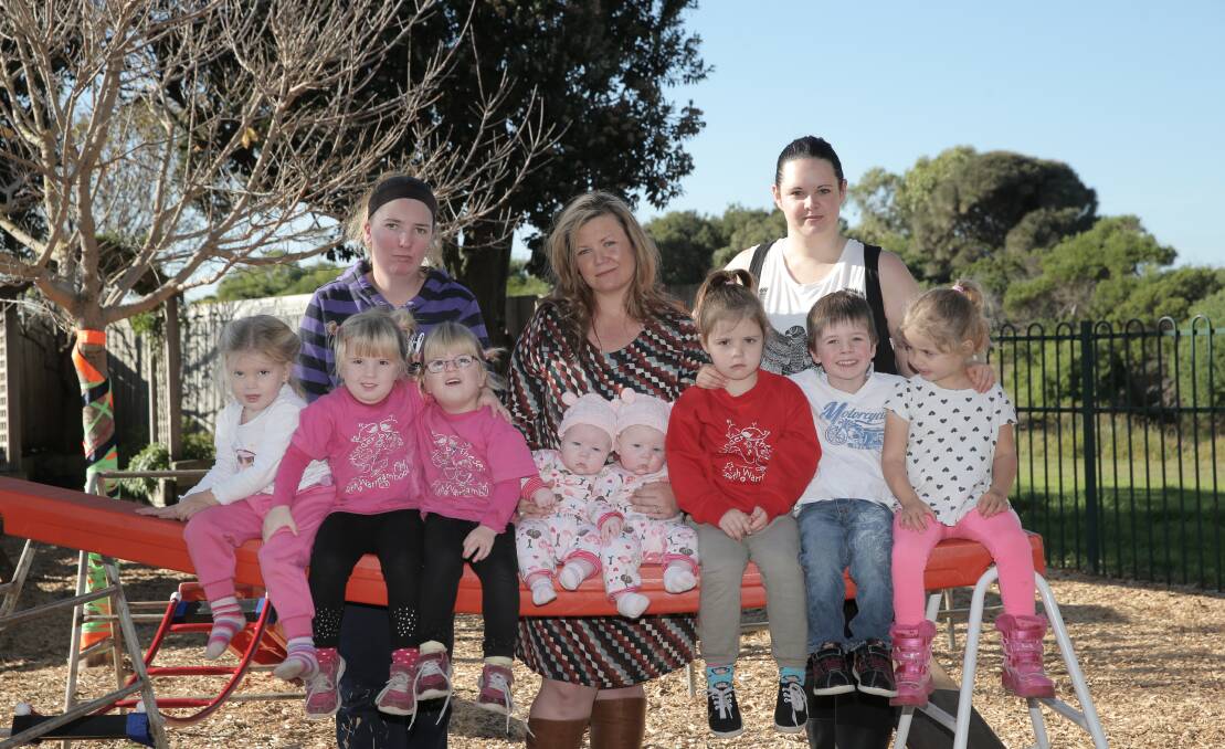 Mothers of twins (back, left) Jess Cashill, with daughters Amelia, 3, and four-year-olds Georgia and Charlie Rowbottom, Melissa Caine and six-month-old daughters Sibylla and Lilah and big sister Maeve, 4, and Kylie Storr with her twins Nathan and Hayley, 3, say parents of triplets or larger multiple-birth families need more government support — not less. 