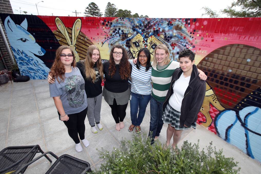 Residents Kayla Adams (left), Bex Sargent, Skye Unwin, Gelli Figuracion, Chloe Yates-Knibbs and Chris Thomas at the unveiling of the mural at Brophy’s The Foyer. 150302DW30 Picture: DAMIAN WHITE