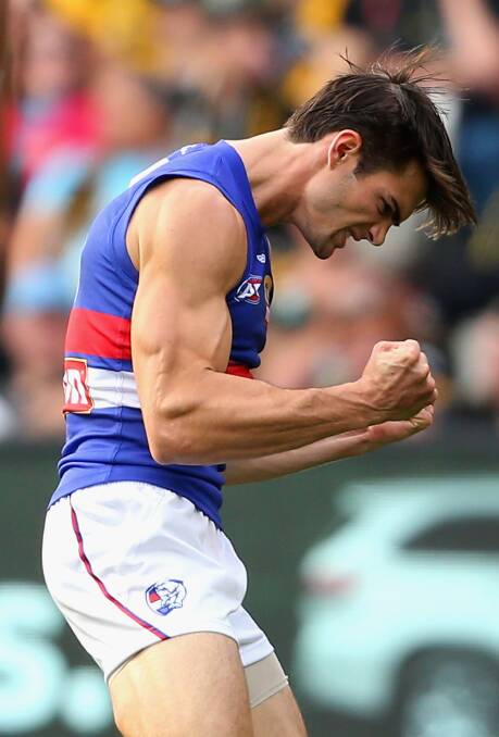 YES!! Camperdown export Easton Wood celebrates kicking a goal for the Western Bulldogs against Richmond last Saturday as well as signing a three-year contract with the club. Picture: GETTY IMAGES