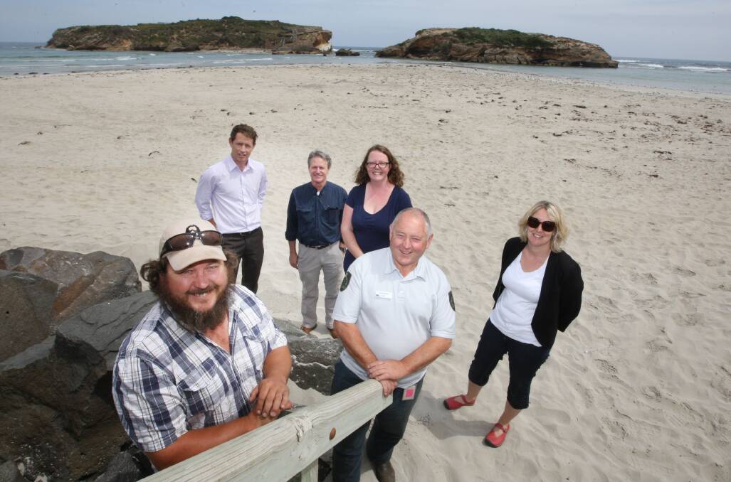 Key players in Warrnambool’s unique Maremma-penguin program on Middle Island: Dave Williams (left), with Ian Fitzgibbon, Craig Whiteford, Amanda Peucker, Stan Williams and Mandy Watson.   