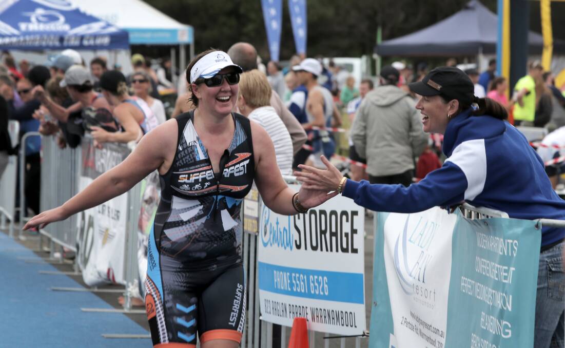 Olyfest finisher Amy Foreman, of Warrnambool, shares her achievement. 