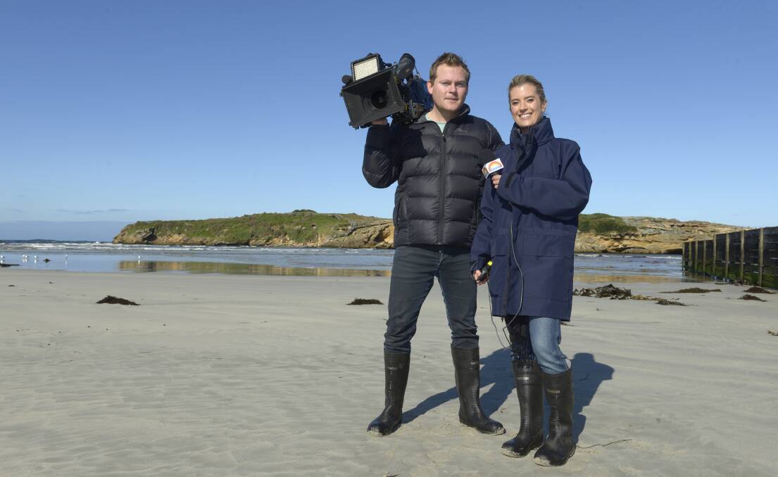 Clear skies greeted Channel Nine cameraman Glenn Edwards and reporter Justine Mackenzie for filming at Middle Island yesterday. 
140821SH01  Picture: STEVE HYNES