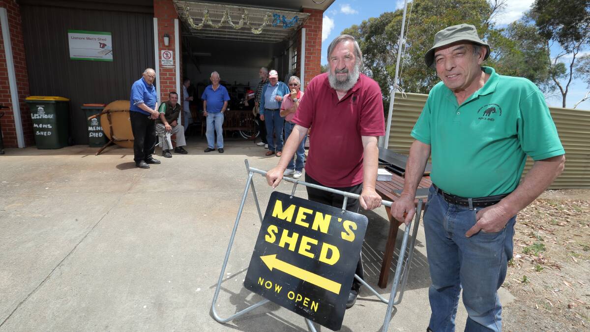 Lismore Men’s Shed secretary Stan Foote (left) and president Peter Grech with fellow users at the existing shed, which they may have to vacate because of space and lease issues. 141217RG15 Picture: ROB GUNSTONE