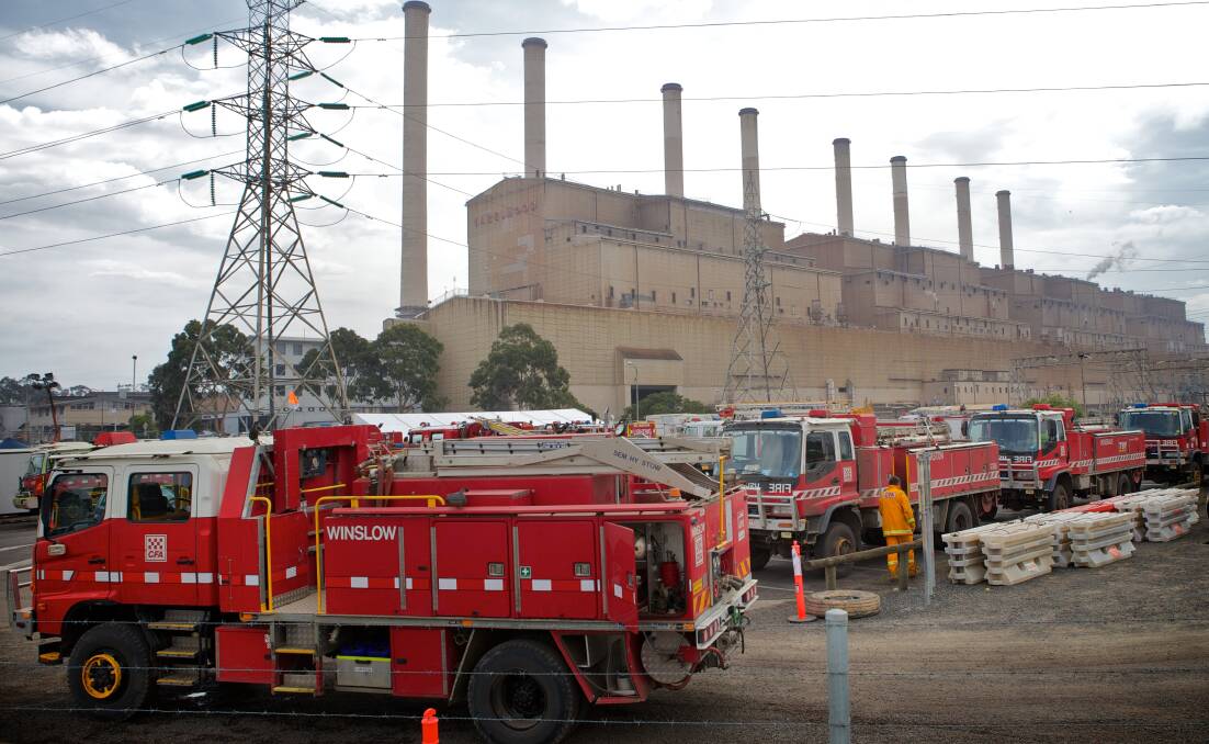 The Winslow CFA brigade truck awaits deployment with other crews from around Victoria to combat the long-running fire in the coal pit at Hazelwood power station at Morwell in Gippsland. 