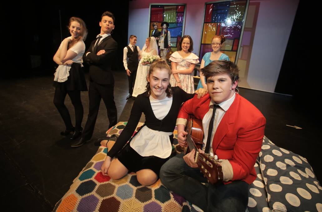 Warrnambool College students rehearse for the stage version of The Wedding Singer, featuring Jessica Benter, 15, as Julia (front left), Billy Sloane, 18, as Robbie, Molly Hoffman, 17 (back left), Raven Hancock, 17, James Lugton, 16, Phoebe Sloane, 16, Tobin Varley, 17, Will Bonney, 15, Maddie Jackway, 17, and Madeline Taylor, 17. 140728RG19 Picture: ROB GUNSTONE