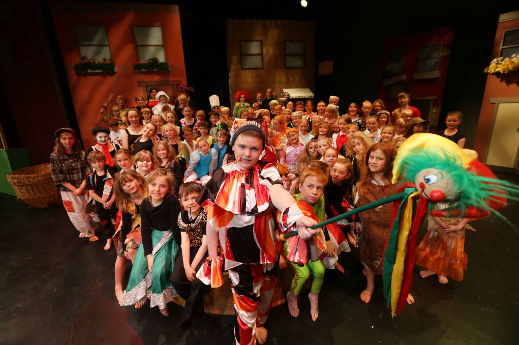 Ashley Rogers-Brigden, 11, (front) is among a host of primary school performers who will stage Masquerade at the Lighthouse Theatre, starting tomorrow. 140915AS41 Picture: AARON SAWALL