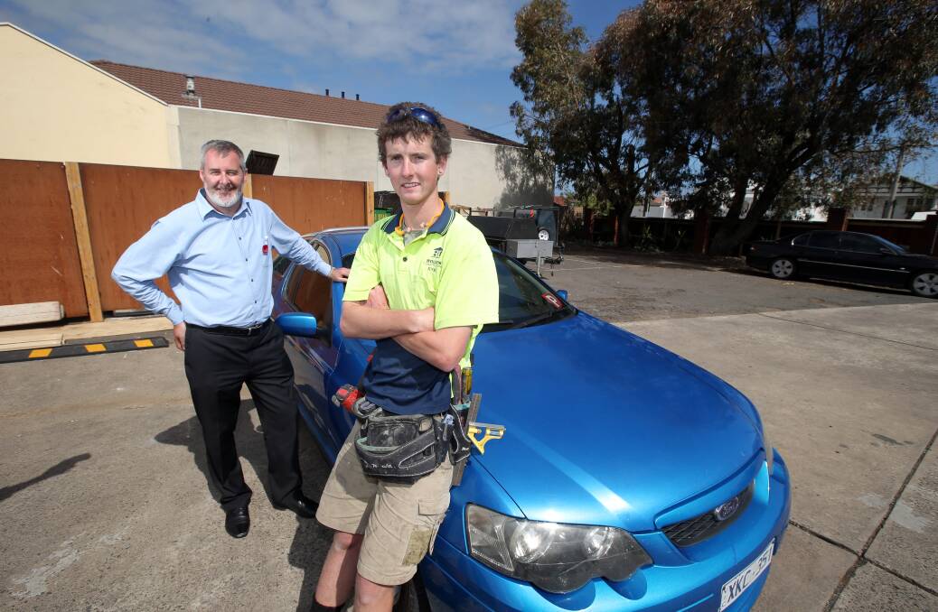 Warrnambool carpentry apprentice Ryan Mitchell discussed the half-price registration proposal yesterday with South West Coast ALP candidate Roy Reekie.141030DW35 Picture: DAMIAN WHITE