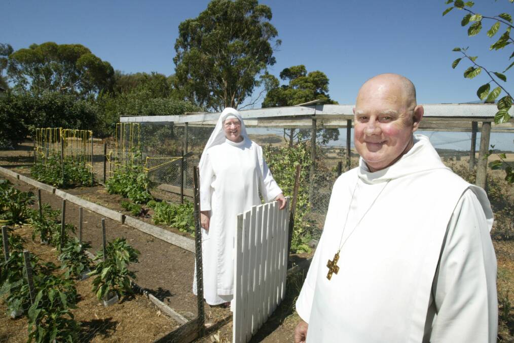 Father Michael King, pictured in the Camperdown abbey’s vegetable garden with Sister Mary Emmanuel in 2009.    090205CC13  Picture: Cassie Cowling 