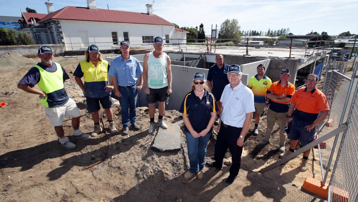 Teamwork: Peter Redford (back left) and Shaen Wilson, from Bolden Construction; Gary Askew, Leahy’s Electrical; Paul Williams, Bolden Construction; Sam Nevill, Nevcom Structural Steel; Shaun McDougall, BDH Constructions; Corey Beveridge, Matt Coleman, Warrnambool Precast; Emma Banner, project manager (front left) and Westvic CEO Miles Coverdale.  