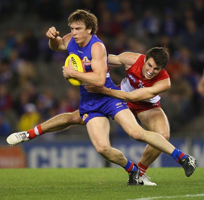 Western Bulldogs tagger Liam Picken in action against Sydney during the 2014 AFL season. Picture: GETTY IMAGES
