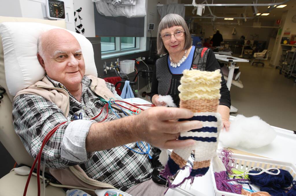 Dialysis patient Gordon Goddard of Allansford used his treatment time to weave a Geelong doll for his neice under the guidance of instructor Marie Cook.   140613AM56Picture: ANGELA MILNE