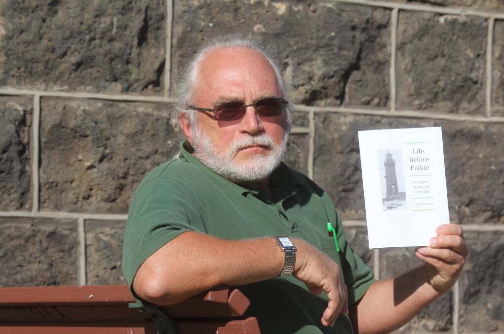 Port Fairy writer and history buff David Jones with his new “visitors’ history” of the town.