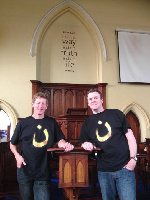 Warrnambool Presbyterian Church pastors Ben Johnson and Toby McIntosh in the Solidarity Sunday T-shirts they wore to protest Islamic State religious oppression.