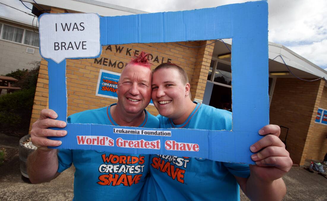 Peter Smith and his daughter Lisa had a close crop at the Hawkesdale Shave for a Cure fund-raiser yesterday.