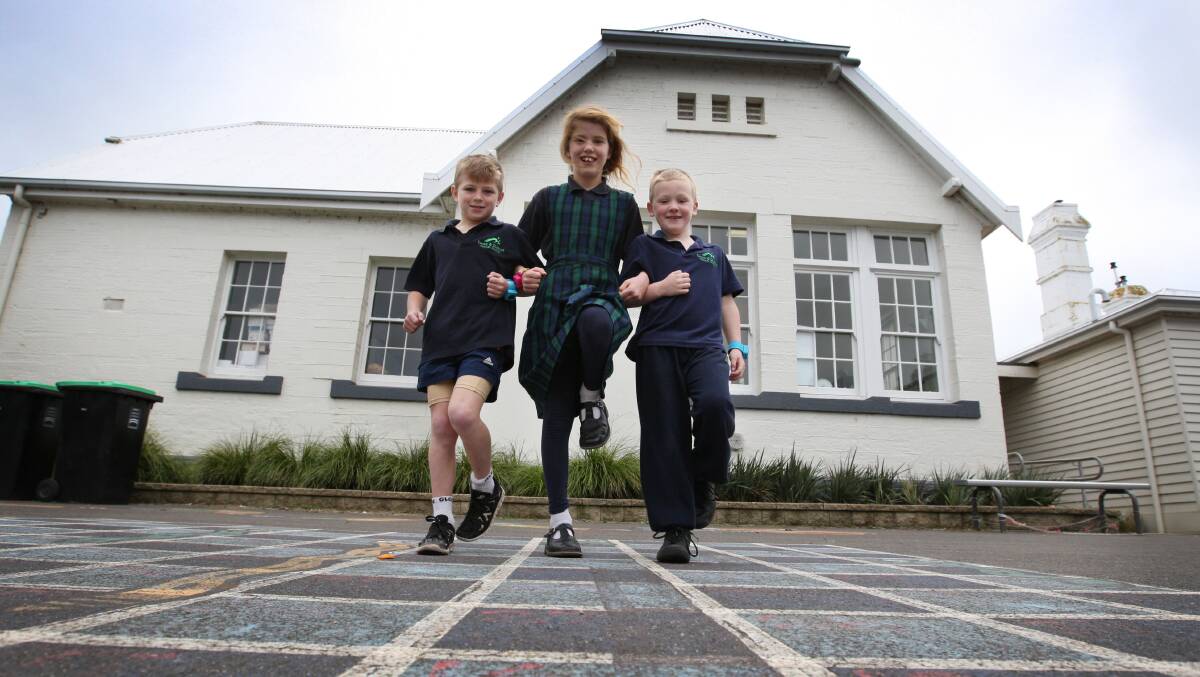 Koroit and District Primary School pupils (from left) Connor Byrne, 9, Sammy Tepper, 9, and Chase Porter, 6, put their best feet forward for the step-a-thon cause. 140806LP02 Picture: LEANNE PICKETT